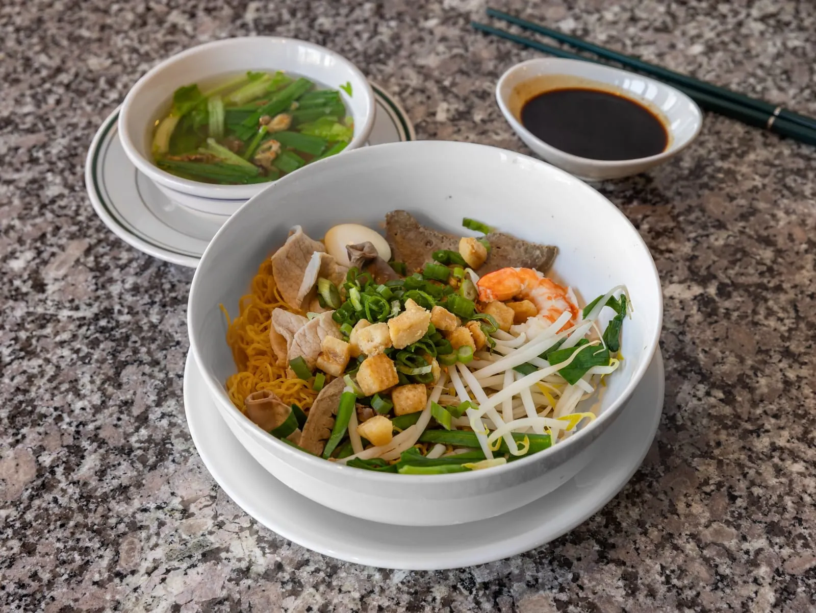 Nam Vang egg noodles with shrimp, sliced pork and a side bowl of broth